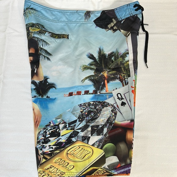 Vibrant Blue and Green Board Shorts with Tropical Design - Picture 2 of 6